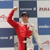 DURBAN, SOUTH AFRICA - FEBRUARY 24:  Canada's Robert Wickens celebrates on the podium after winning the A1GP Sprint Race on February 24, 2008 in Durban, South Africa.  (Photo by Tertius Pickard/Gallo Images/Getty Images)