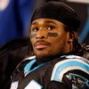 CHARLOTTE, NC - JANUARY 10:  DeAngelo Williams #34 of the Carolina Panthers look on from the bench in the fourth quarter of the game against the Arizona Cardinals during the NFC Divisional Playoff Game on January 10, 2009 at Bank of America Stadium in Cha