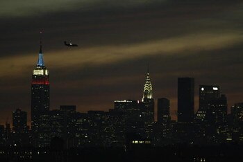 FLUSHING, NY - AUGUST 30:  A view of the city skyline taken at dusk during the US Open August 30, 2002 at the USTA National Tennis Center in Flushing Meadows Corona Park in Flushing, New York.  (Photo by Ronald Martinez/Getty Images)