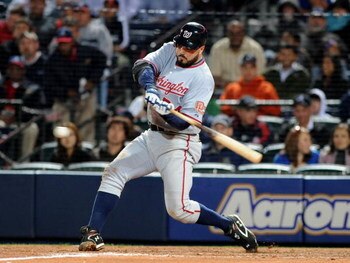 ATLANTA - APRIL 11: Infielder Nick Johnson #24 of the Washington Nationals bats against the Atlanta Braves on April 11, 2009 at Turner Field in Atlanta, Georgia.  (Photo by Al Messerschmidt/Getty Images) 