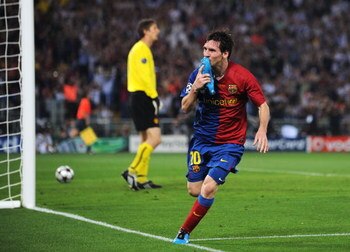 ROME - MAY 27:  Lionel Messi of Barcelona celebrates scoring the second goal for Barcelona during the UEFA Champions League Final match between Barcelona and Manchester United at the Stadio Olimpico on May 27, 2009 in Rome, Italy.  (Photo by Jasper Juinen