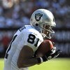 TAMPA, FL - DECEMBER 28: Wide receiver Chaz Schilens #81 of the Oakland Raiders grabs a seocnd-quarter sideline pass against the Tampa Bay Buccaneers at Raymond James Stadium on December 28, 2008 in Tampa, Florida.  (Photo by Al Messerschmidt/Getty Images