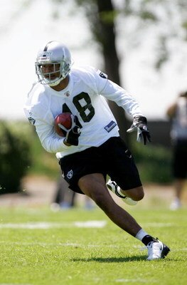 ALAMEDA, CA - MAY 08:  Louis Murphy #18 of the Oakland Raiders runs with the ball during the Raiders minicamp at the team's permanent training facility on May 8, 2009 in Alameda, California.  (Photo by Ezra Shaw/Getty Images)