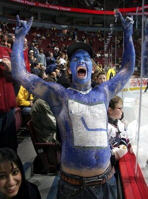 VANCOUVER, CANADA - JANUARY 11:  A fan shows off his painted body as he cheers prior to the start of the Vancouver Canucks and Minnesota Wild game at General Motors Place on January 11, 2007 in Vancouver, Canada.  (Photo by Jeff Vinnick/Getty Images)