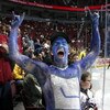 VANCOUVER, CANADA - JANUARY 11:  A fan shows off his painted body as he cheers prior to the start of the Vancouver Canucks and Minnesota Wild game at General Motors Place on January 11, 2007 in Vancouver, Canada.  (Photo by Jeff Vinnick/Getty Images)