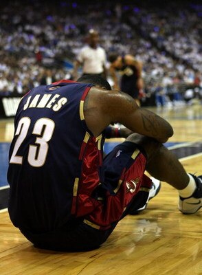 ORLANDO, FL - MAY 30: LeBron James #23 of the Cleveland Cavaliers sits on the court after being fouled by the Orlando Magic in Game Six of the Eastern Conference Finals during the 2009 Playoffs at Amway Arena on May 30, 2009 in Orlando, Florida. NOTE TO U