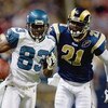 ST. LOUIS, MO - DECEMBER 14:  Deion Branch #83 of the Seattle Seahawks carries the ball against Oshiomogho Atogwe #21 of the St. Louis Rams at the Edward Jones Dome on December 14, 2008 in St. Louis, Missouri.    (Photo by: Dilip Vishwanat/Getty Images)