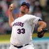 ARLINGTON, TX - JULY 29:  Starting pitcher Kevin Millwood #33 of the Texas Rangers throws against the Kansas City Royals on July 29, 2006 at Ameriquest Field in Arlington, Texas.  (Photo by Ronald Martinez/Getty Images)