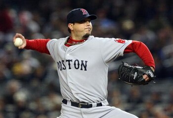 NEW YORK - MAY 05:  Josh Beckett #19 of the Boston Red Sox delivers a pitch against the New York Yankees on May 5, 2009 at Yankee Stadium in the Bronx borough of New York City. The Red Sox defeated the Yankees 7-3.  (Photo by Jim McIsaac/Getty Images)