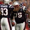 FOXBORO, MA - SEPTEMBER 8:  Defensive lineman Vince Wilfork #75 of the New England Patriots is congratulated by teammate Richard Seymour #93 after an interception against the Oakland Raiders during the 2005 NFL opening game at Gillette Stadium on Septembe