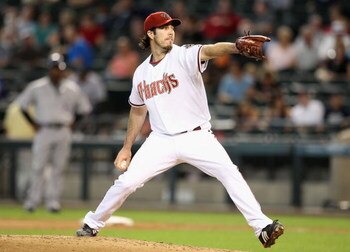 PHOENIX - APRIL 22:  Starting pitcher Dan Haren #15 of the Arizona Diamondbacks pitches against the Colorado Rockies during the game at Chase Field on April 22, 2009 in Phoenix, Arizona. The Diamondbacks defeated the Rockies 2-0.  (Photo by Christian Pete