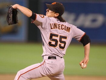OAKLAND, CA - JUNE 23:  Tim Lincecum #55 of the San Francisco Giants pitches against the Oakland Athletics during a Major League Baseball game on June 23, 2009 at the Oakland Coliseum in Oakland, California.  (Photo by Jed Jacobsohn/Getty Images)
