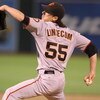 OAKLAND, CA - JUNE 23:  Tim Lincecum #55 of the San Francisco Giants pitches against the Oakland Athletics during a Major League Baseball game on June 23, 2009 at the Oakland Coliseum in Oakland, California.  (Photo by Jed Jacobsohn/Getty Images)