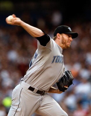 NEW YORK - JUNE 03:  Roy Halladay #32 of the Toronto Blue Jays pitches against the New York Yankees on June 3, 2008 at Yankee Stadium in the Bronx borough of New York City.  (Photo by Nick Laham/Getty Images)