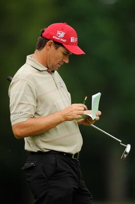 FARMINGDALE, NY - JUNE 16:  Padraig Harrington of Ireland writes in his yardage book during the second day of previews to the 109th U.S. Open on the Black Course at Bethpage State Park on June 16, 2009 in Farmingdale, New York.  (Photo by Sam Greenwood/Ge