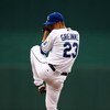 KANSAS CITY, MO - JUNE 17:  Starting pitcher Zack Greinke #23 of the Kansas City Royals pitches just prior to the start of the game against  the Arizona Diamondbacks on June 17, 2009 at Kauffman Stadium in Kansas City, Missouri.  (Photo by Jamie Squire/Ge