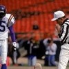SAN FRANCISCO - OCOTBER 3:  Quarterback Steve Young #8 of the San Francisco 49ers attempts to get up off the field after taking a big hit against the Minnesota Vikings at Candlestick Park on October 3, 1993 in San Francisco, California.  The 49ers won 38-