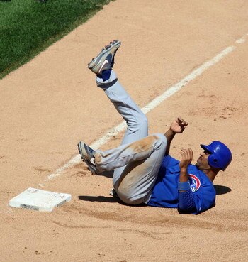 CHICAGO - JUNE 28:  Derrek Lee #25 of the Chicago Cubs reacts after being forced out at third base with the bases loaded to end the Cubs half of the 6th inning against the Chicago White Sox on June 28, 2009 at U.S. Cellular Field in Chicago, Illinois. The