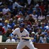 CHICAGO - MAY 2:  Kosuke Fukudome #1 of the Chicago Cubs bunts against the Florida Marlins during the game on May 2, 2009 at Wrigley Field in Chicago, Illinois. (Photo by Jonathan Daniel/Getty Images) 