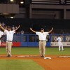 NEW YORK - SEPTEMBER 21: The grounds crew perform the 'YMCA' between innings of the New York Yankees game agaionst Baltimore Orioles during the last regular season game at Yankee Stadium on September 21, 2008 in the Bronx borough of New York City. The Yan