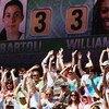 LONDON - JULY 07:  Spectators perform a 'Mexican Wave' during the Women's Singles final match between Venus Williams of USA and Marion Bartoli of France during day twelve of the Wimbledon Lawn Tennis Championships at the All England Lawn Tennis and Croque