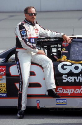 30 Apr 2000: Dale Earnhardt Sr. poses with his car during the NAPA Auto Parts 500, Part of the NASCAR Winston Cup Series, at the California Speedway in Fontana, California. Mandatory Credit: Jon Ferrey  /Allsport