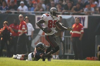 CHICAGO - SEPTEMBER 21:  Antonio Bryant #89 of the Tampa Bay Buccaneers runs with the ball against Nathan Vasher #31 of the Chicago Bears at Soldier Field on September 21, 2008 in Chicago, Illinois. The Buccaneers won 27-24 in OT. (Photo by Jonathan Ferre