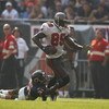 CHICAGO - SEPTEMBER 21:  Antonio Bryant #89 of the Tampa Bay Buccaneers runs with the ball against Nathan Vasher #31 of the Chicago Bears at Soldier Field on September 21, 2008 in Chicago, Illinois. The Buccaneers won 27-24 in OT. (Photo by Jonathan Ferre