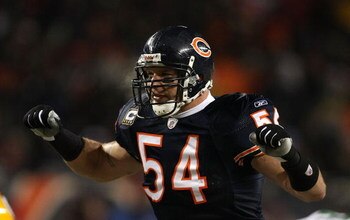 CHICAGO - DECEMBER 22: Brian Urlacher #54 of the Chicago Bears calls defensive signals against the Green Bay Packers on December 22, 2008 at Soldier Field in Chicago, Illinois. The Bears defeated the Packers 20-17 in overtime. (Photo by Jonathan Daniel/Ge