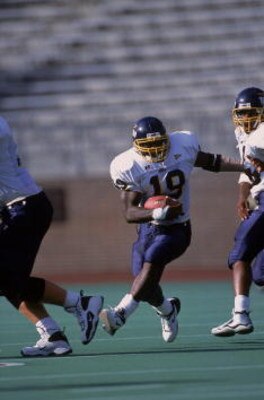 8 Sep 2001:   Chester Taylor #19 of the Toledo Rockets running with the ball during the game against the Temple Owls at Franklin Field in Philadelphia, Pennsylvania. The Rockets defeated the Owls 33-7.Mandatory Credit: Eliot Schechter  /Allsport