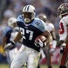 NASHVILLE, TN - DECEMBER 28:  Running back Eddie George #27 of the Tennessee Titans runs the football during the game against the Tampa Bay Buccaneers on December 28, 2003 at The Coliseum in Nashville, Tennessee. The Titans defeated the Buccaneers 33-13. 