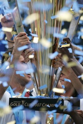 CHICAGO - JUNE 24:  A detail of Team USA celebrating with the trophy after their 2-1 win against Mexico against the USA during the CONCACAF Gold Cup Final match at Soldier Field on June 24, 2007 in Chicago, Illinois.  (Photo by Jonathan Daniel/Getty Image