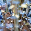 CHICAGO - JUNE 24:  A detail of Team USA celebrating with the trophy after their 2-1 win against Mexico against the USA during the CONCACAF Gold Cup Final match at Soldier Field on June 24, 2007 in Chicago, Illinois.  (Photo by Jonathan Daniel/Getty Image