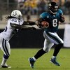 JACKSONVILLE, FL - DECEMBER 18:  David Garrard #9 of the Jacksonville Jaguars breaks the tackle of Clint Session #55 of the Indinapolis Colts during the game at Jacksonville Municipal Stadium on December 18, 2008 in Jacksonville, Florida.  (Photo by Sam G