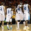 NEW ORLEANS - APRIL 25:  (L-R) Sean Marks #4, Chris Paul #4,James Posey #41 and Rasual Butler #45 of the New Orleans Hornets walk across the court during Game Three of the Western Conference Quarterfinals against the Denver Nuggets during the 2009 NBA Pla