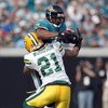 JACKSONVILLE, FL - DECEMBER 14:  Charles Woodson #21 of the Green Bay Packers attempts to tackle Maurice Jones-Drew #32 of the Jacksonville Jaguars during the game at Jacksonville Municipal stadium on December 14, 2008 in Jacksonville, Florida.  (Photo by