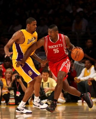 LOS ANGELES, CA - MAY 12:  Ron Artest #96 of the Houston Rockets drives on Trevor Ariza #3 the first quarter of Game Five of the Western Conference Semifinals during the 2009 NBA Playoffs at Staples Center on May 12, 2009 in Los Angeles, California. NOTE 