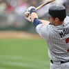 OAKLAND, CA - JUNE 11:  Joe Mauer #7 of the Minnesota Twins bats against the Oakland Athletics during a Major League Baseball game on June 11, 2009 at the Oakland Coliseum in Oakland, California.  (Photo by Jed Jacobsohn/Getty Images)