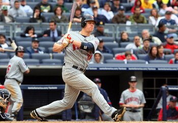 NEW YORK - MAY 17:  Justin Morneau #33 of the Minnesota Twins bats against the New York Yankees on May 17, 2009 at Yankee Stadium in the Bronx borough of New York City. The Yankees defeated the Twins 3-2 in ten innings.  (Photo by Jim McIsaac/Getty Images