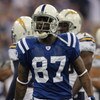 INDIANAPOLIS - JANUARY 13:  Reggie Wayne #87 of the Indianapolis Colts reacts after he made a reception for a first down on a 4th and 2 play in the first quarter against the San Diego Chargers during their AFC Divisional Playoff game at the RCA Dome on Ja