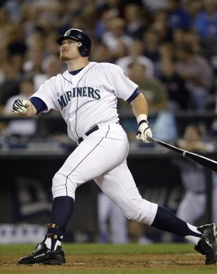 SEATTLE - AUGUST 25:  Bucky Jacobsen #33 of the Seattle Mariners watches his three run home run in the sixth ining against the Tampa Bay Devil Rays on August 25, 2004 at Safeco Field in Seattle, Washington. The Devil Rays defeated the Mariners 6-5.  (Phot