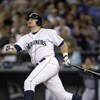 SEATTLE - AUGUST 25:  Bucky Jacobsen #33 of the Seattle Mariners watches his three run home run in the sixth ining against the Tampa Bay Devil Rays on August 25, 2004 at Safeco Field in Seattle, Washington. The Devil Rays defeated the Mariners 6-5.  (Phot