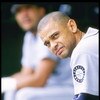 16 Jul 1996:  Second baseman Joey Cora of the Seattle Mariners sits in the dugout during a game against the Oakland Athletics at the Oakland Coliseum in Oakland, California.  The Athletics won the game 12-5. Mandatory Credit: Otto Greule Jr.  /Allsport