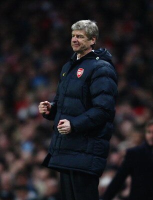 LONDON - FEBRUARY 24:  Manager of Arsenal Arsene Wenger smiles during the UEFA Champions League First knockout round, First Leg match between Arsenal and A.S. Roma at Emirates Stadium on February 24, 2009 in London, England.  (Photo by Jamie McDonald/Gett