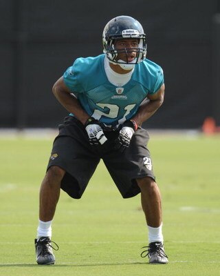 JACKSONVILLE, FL - MAY 1:  Cornerback Derek Cox #21 of the Jacksonville Jaguars sets on defense during a team mini-camp on May 1, 2009 on the practice fields at Jacksonville Municipal Stadium in Jacksonville, Florida.  (Photo by Al Messerschmidt/Getty Ima