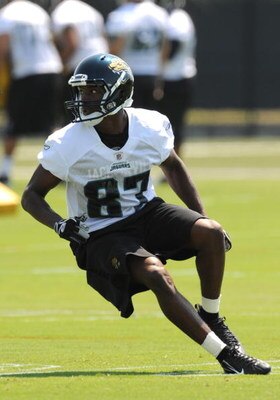 JACKSONVILLE, FL - MAY 1:  Wide receiver Jarett Dillard #87 of the Jacksonville Jaguars runs for a pass May 1, 2009 at a team minicamp near Jacksonville Municipal Stadium in Jacksonville, Florida.  (Photo by Al Messerschmidt/Getty Images)