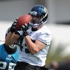 JACKSONVILLE, FL - MAY 1:  Tight end Zach Miller #49 of the Jacksonville Jaguars grabs a pass during a team mini-camp on May 1, 2009 on the practice fields at Jacksonville Municipal Stadium in Jacksonville, Florida.  (Photo by Al Messerschmidt/Getty Image