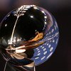 TAMPA, FL - JANUARY 30:  The reflection of head coach Mike Tomlin of the Pittsburgh Steelers is seen in the Vince Lombardi trophy during the AFC Head coach press conference prior to Super Bowl XLIII held at the Tampa Convention Center on January 30, 2009 