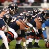 CHICAGO - NOVEMBER 09:  Olin Kreutz #57 of the Chicago Bears centers the ball at the line of scrimmage against the Tennessee Titans at Soldier Field on November 9, 2008 in Chicago, Illinois. The Titans won 21-14. (Photo by Jonathan Ferrey/Getty Images)