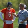 LAKE FOREST, IL - MAY 20:  Jay Cutler #6 of the Chicago Bears and offensive coordinator Ron Turner discuss a play during an organized team activity (OTA) practice on May 20, 2009 at Halas Hall in Lake Forest, Illinois.  (Photo by Jonathan Daniel/Getty Ima